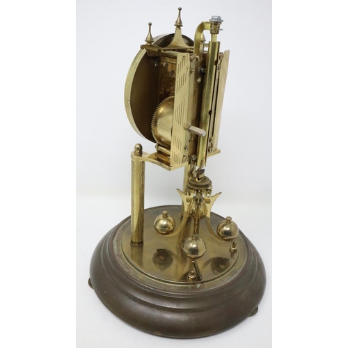 467 - Forestville Clock Company lacquered brass anniversary clock under glass dome, overall H: 29 cm. Not ... 