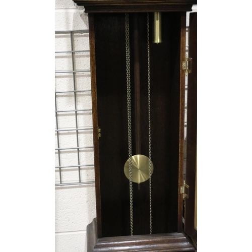 469 - 20th century German longcase clock in panelled oak case with pendulum display door, not working at l... 