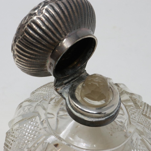 124 - Hallmarked silver topped scent bottle and a further hallmarked silver collared glass bowl, silver lo... 