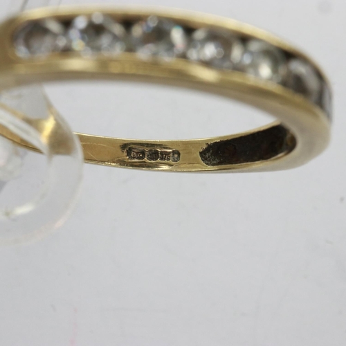 21 - 9ct gold half eternity ring set with cubic zirconia, size O, 1.8g. UK P&P Group 0 (£6+VAT for the fi... 