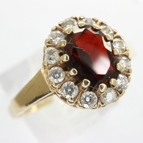 34 - 9ct gold cluster ring set with garnet and cubic zirconia, size R, 2.4g. UK P&P Group 0 (£6+VAT for t... 