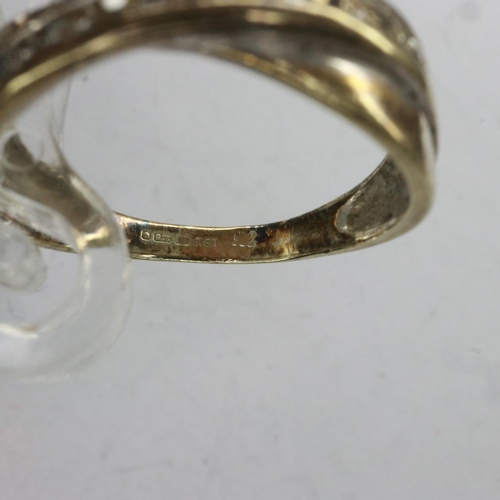 37 - 9ct gold crossover ring set with diamonds, size L, 2.1g. UK P&P Group 0 (£6+VAT for the first lot an... 