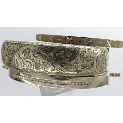 44 - Three silver bangles including two hallmarked silver examples, largest D: 70 mm. UK P&P Group 1 (£16... 