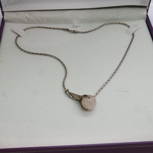 55 - Silver pendant necklace with rose quartz in a claw setting, L: 40 cm, boxed. UK P&P Group 1 (£16+VAT... 