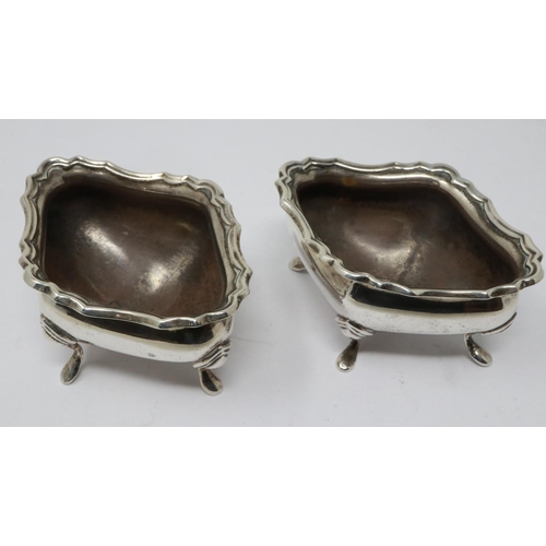 83 - Pair of hallmarked silver open salts on four footed supports, Birmingham assay, L: 80 mm, 107g. UK P... 