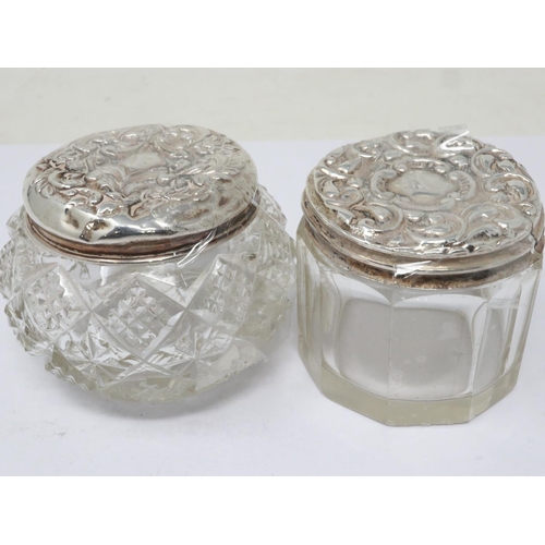 87 - Two glass pots with hallmarked silver tops, largest H: 45 mm. UK P&P Group 1 (£16+VAT for the first ... 