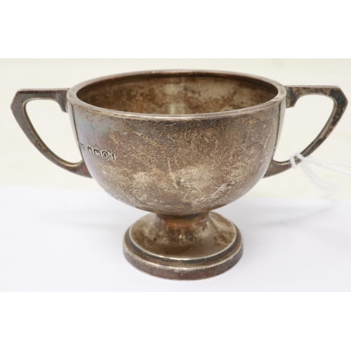 92 - Diminutive hallmarked silver twin handled trophy, awarded to A. Rutter for Sportsman of the Year 195... 