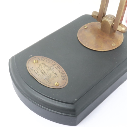 132 - Brass magnifying glass on a wooden base. UK P&P Group 1 (£16+VAT for the first lot and £2+VAT for su... 