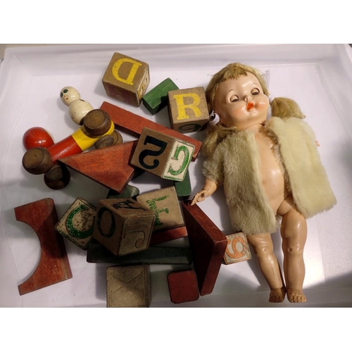 1080 - 1950's celluloid doll and vintage building bricks. Not available for in-house P&P