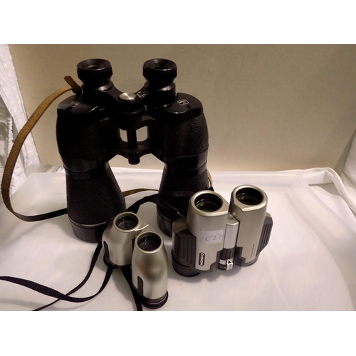 1090 - Three pairs of binoculars including, Sunagor and Chinon examples. Not available for in-house P&P