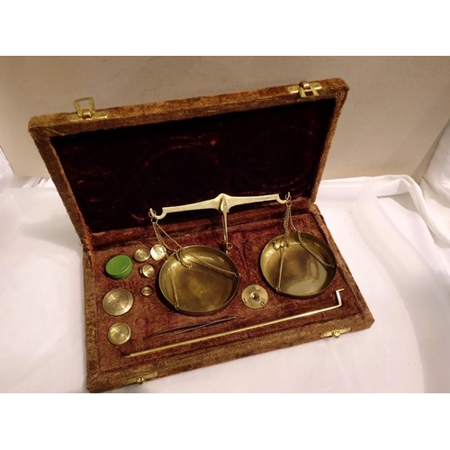 1094 - Velvet cased brass scales set with weights. UK P&P Group 1 (£16+VAT for the first lot and £2+VAT for... 