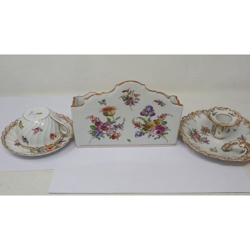 190 - Dresden painted and gilt chamber stick with a letter rack and cup with saucer in the same design, no... 