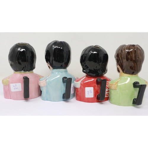 230 - Set of four limited edition Beatles character jugs, no cracks or chips, H: 14 cm. UK P&P Group 3 (£3... 