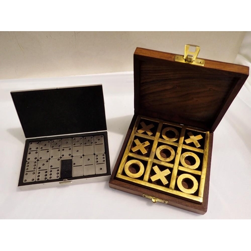 1113 - Cased set of miniature stainless steel dominoes and a boxed noughts and crosses game. UK P&P Group 1... 