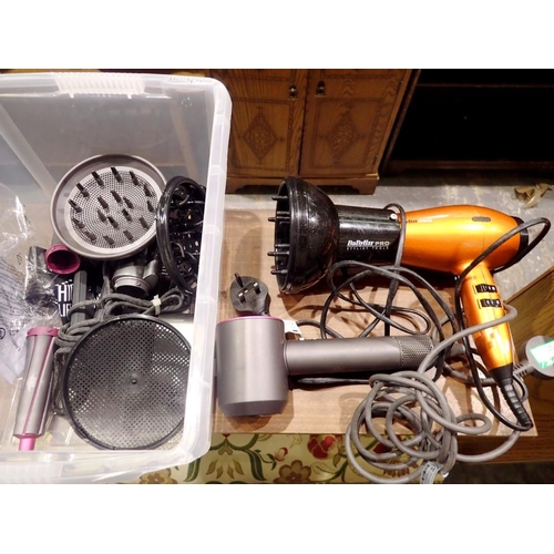 1013 - Dyson Supersonic hair dryer and accessories and other hair dryers. All electrical items in this lot ... 