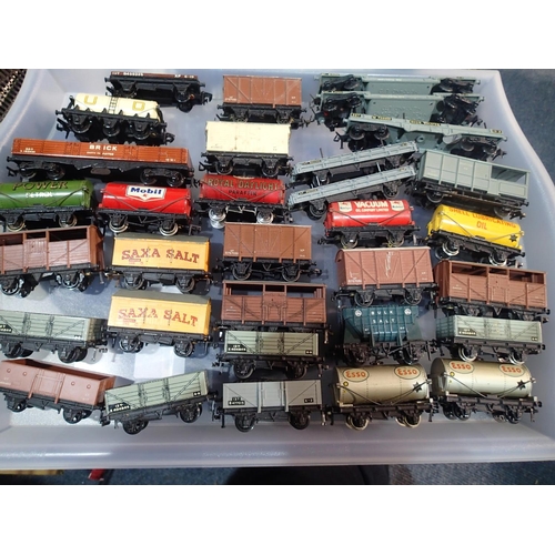 2068 - Thirty two OO scale Hornby Dublo wagons, mostly 2/3 rail, brake, tankers, including six wheel milk, ... 