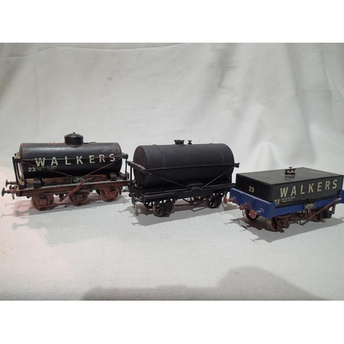 2112 - Three O gauge kit built tanker wagons, six wheel walkers, long tank walkers, unnamed black, all fini... 