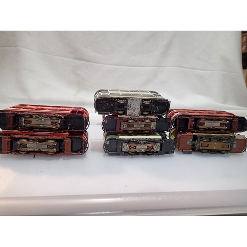 2186 - Seven OO scale motorised kit built trams, fitted Tenshodo type motors. All four wheel type, built an... 