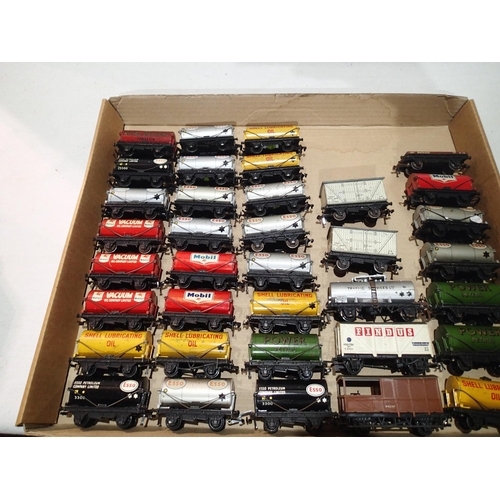 2209 - Thirty six OO scale Hornby Dublo wagons, mostly tankers, fair to good condition, unboxed. UK P&P Gro... 