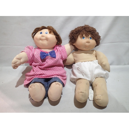 2213 - Two vintage Cabbage Patch kids, girl with blue eyes, dress and jeans, boy with blue eyes in nappy, H... 