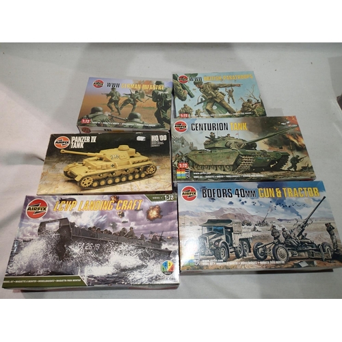 2276 - 1/72 military related vehicles and figures; Airfix landing craft, Bofors gun and tractor, Centurion ... 