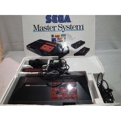 2361 - Sega Master System power base, transformer, one control pad, plus two games, The Ninja and Californi... 