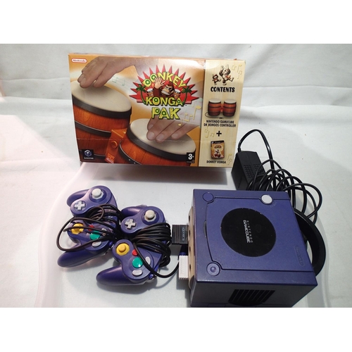 2366 - Nintendo game Cube with two controllers and power pack, appear good/used, unboxed plus Donkey Konga ... 