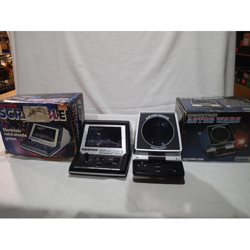 2368 - Two Grandstand vintage electronic games, Scramble and Astro Wars, both appear in good condition, box... 