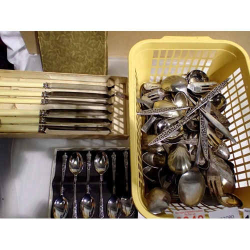 1056 - Quantity of mixed cutlery including hallmarked silver examples. Not available for in-house P&P