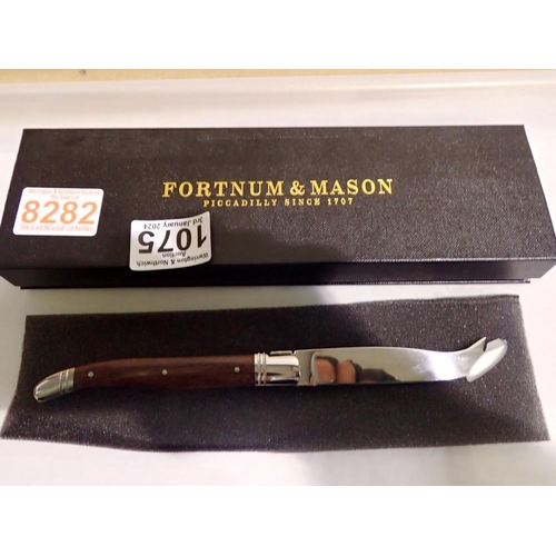 1075 - Boxed Fortnum & Mason cheese knife, good clean condition, appears unused, still has seal over the bl... 