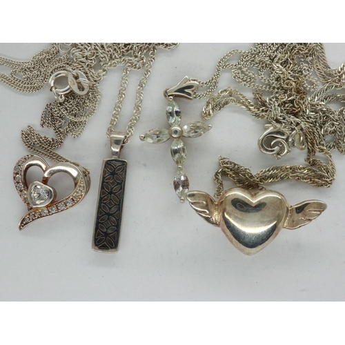 35 - Four 925 silver pendant necklaces, largest chain L: 52 cm. UK P&P Group 1 (£16+VAT for the first lot... 