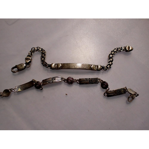 1152 - Two silver bracelets, including a Rene MckIntosh style example. UK P&P Group 1 (£16+VAT for the firs... 