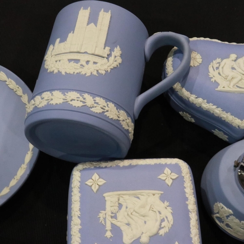 279 - Mixed Wedgwood Jasperware ceramics all in powder blue, including covered boxes, table lighter and ca... 