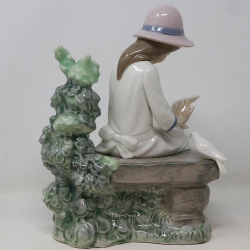 292 - Large Nao figurine of a seated girl with doves, no cracks or chips, H: 24 cm. UK P&P Group 3 (£30+VA... 