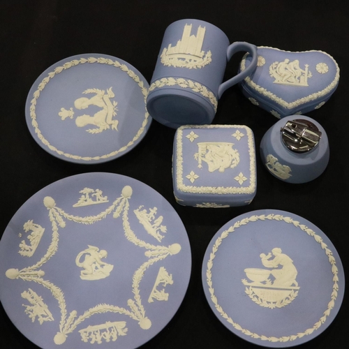 279 - Mixed Wedgwood Jasperware ceramics all in powder blue, including covered boxes, table lighter and ca... 