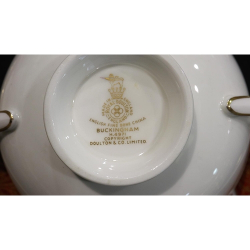 231 - Substantial Royal Doulton dinner and teaware in the Buckingham pattern of fifty pieces, claret and g... 