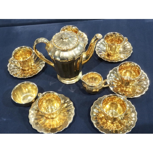 245 - Wade gilt coffee service of fifteen pieces, surface marks thoughout, small chips to base of coffee p... 