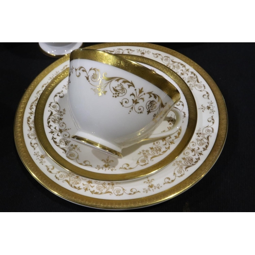 305 - Royal Doulton tea and dinnerware in the Belmont pattern of thirty nine pieces, very light use marks.... 