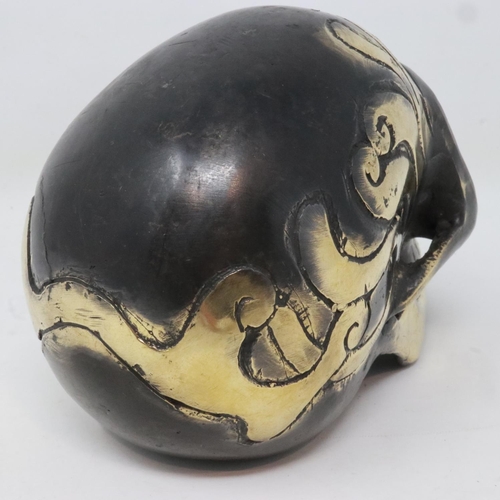 327 - Contemporary decorated bronze skull, H: 10 cm. UK P&P Group 1 (£16+VAT for the first lot and £2+VAT ... 