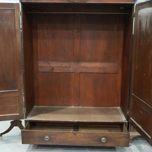 1609A - Early 19th century Irish mahogany linen press with two false drawers to each door and a single botto... 