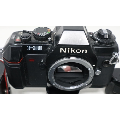 421 - Nikon F301 camera body with Nikon motor drive MD12 & Nikon accessories. UK P&P Group 1 (£16+VAT for ... 