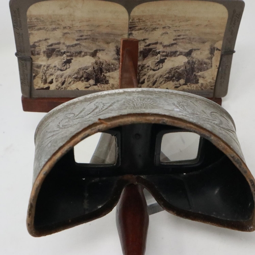 422 - Edwardian Underwood & Underwood stereoscope with approximately thirty slides. Not available for in-h... 