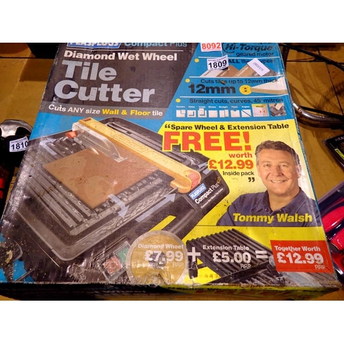 1809 - Plasplugs diamond wet wheel tile cutter, boxed. Not available for in-house P&P