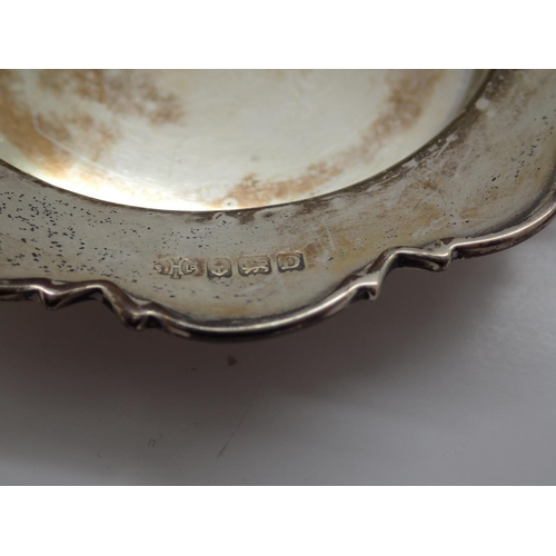 100A - A pair of hallmarked silver trays, each D: 10 cm, combined 105g. UK P&P Group 1 (£16+VAT for the fir... 