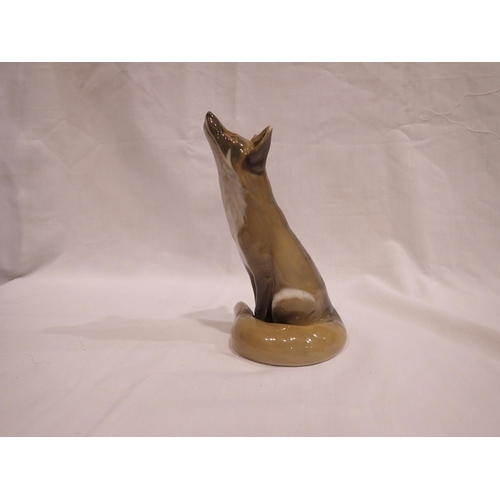 212 - Royal Copenhagen figurine of a seated fox, no cracks or chips, H: 15 cm. UK P&P Group 1 (£16+VAT for... 