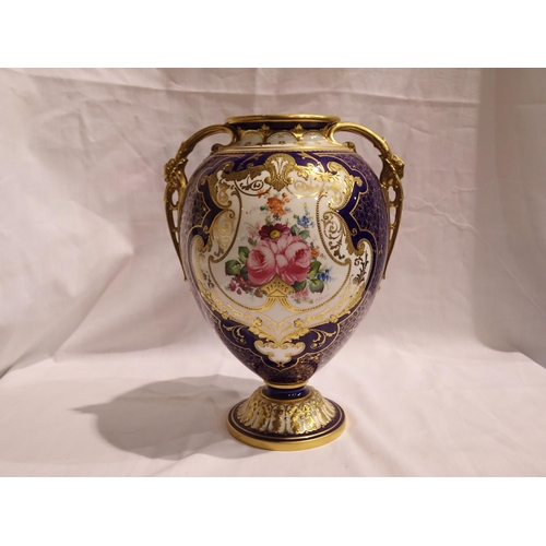 229 - Royal Crown Derby vase by Cuthbert Gresley with twin gilt handles and floral painted against a cobal... 