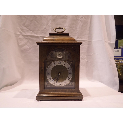 350A - Elliott burr walnut cased table clock for Boodle & Dunthorne, not working at lotting, H: 27 cm. UK P... 