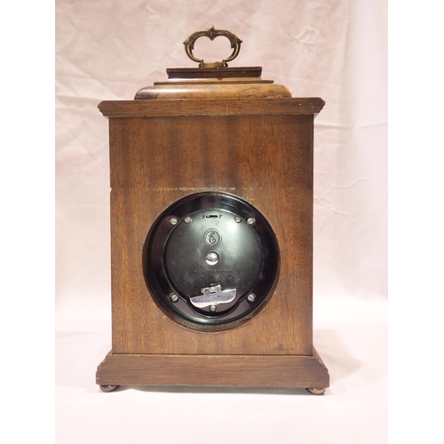 350A - Elliott burr walnut cased table clock for Boodle & Dunthorne, not working at lotting, H: 27 cm. UK P... 