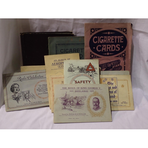 404A - Mixed cigarette cards in albums. UK P&P Group 2 (£20+VAT for the first lot and £4+VAT for subsequent... 