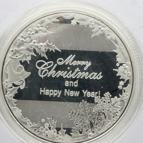 2176 - Christmas commemorative enamelled silver coin. UK P&P Group 0 (£6+VAT for the first lot and £1+VAT f... 